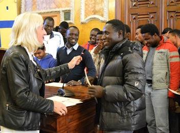 immigrati accoglienza progetto volontari min
