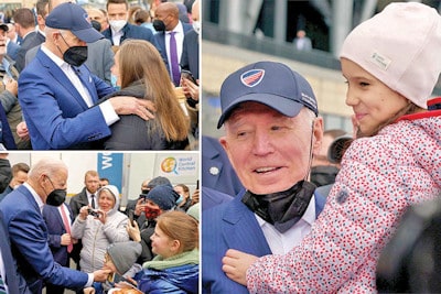 ok biden a Varsavia bambini e profughi 400 min